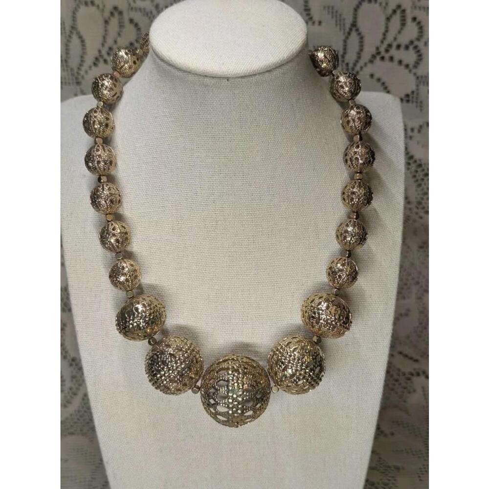 Elegant Gold-Tone Filigree Necklace with Statement Balls